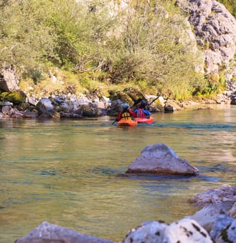 Kayaking in the summer on the Soca river, Slovenia