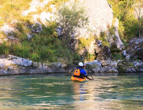 Kayaking in the summer on the Soca river, Slovenia