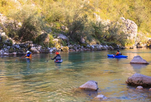 Kayaking in the summer on the Soca river, Slovenia