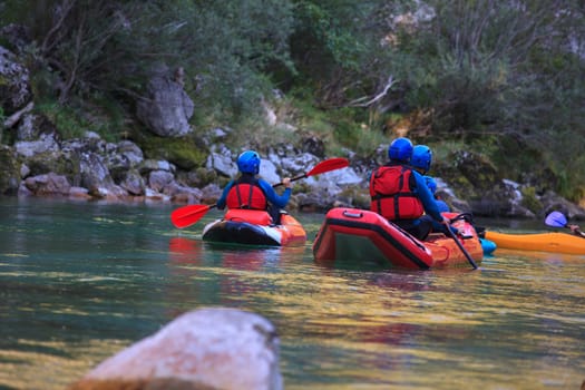 Kayaking in the summer on the Soca river, Slovenia