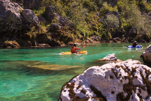 Kayaking in the summer on the Soca river, Slovenia