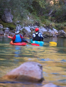 Kayaking in the summer on the Soca river, Slovenia