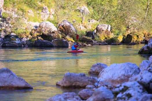 Kayaking in the summer on the Soca river, Slovenia