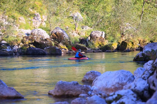 Kayaking in the summer on the Soca river, Slovenia