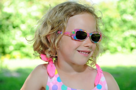 Smiling Girl with Sunglasses