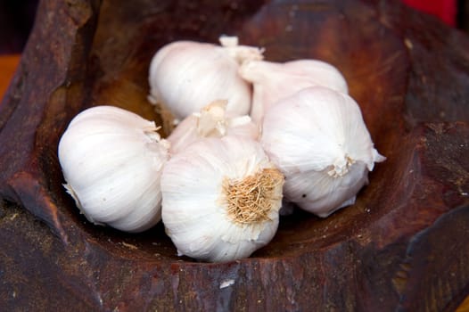 garlic in a wooden bowl