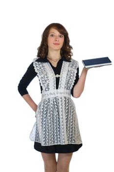 The girl in a school uniform with a book in hand