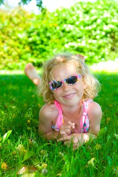 Smiling Girl with Sunglasses
