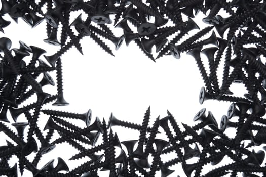 frame of black screws on white background