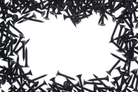 frame of black screws on white background