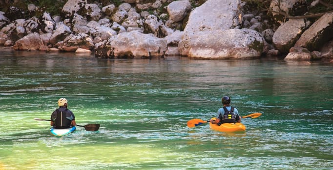 Kayaking in the summer on the Soca river, Slovenia