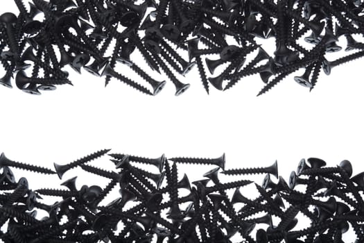 frame of black screws on white background
