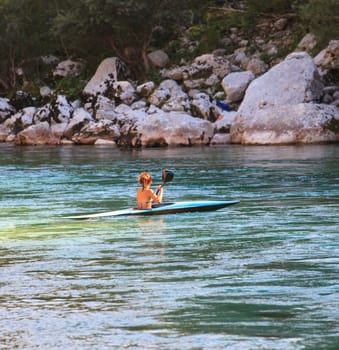 Kayaking in the summer on the Soca river, Slovenia