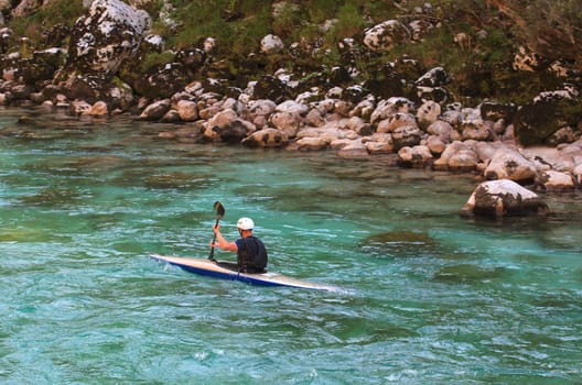 Kayaking in the summer on the Soca river, Slovenia