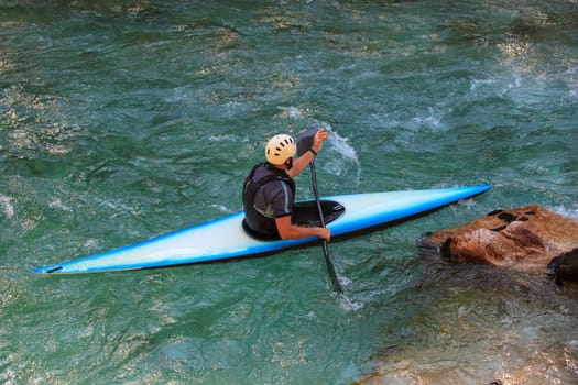 Kayaking in the summer on the Soca river, Slovenia