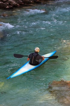 Kayaking in the summer on the Soca river, Slovenia