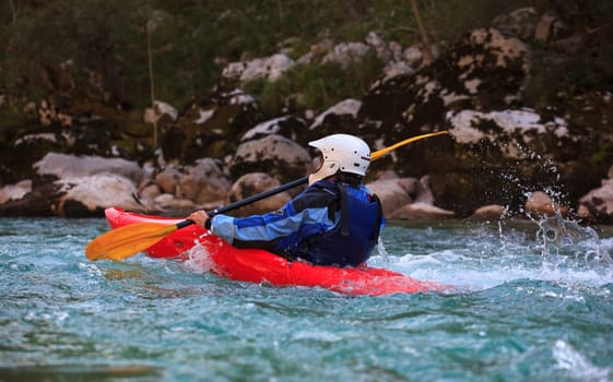 Kayaking in the summer on the Soca river, Slovenia