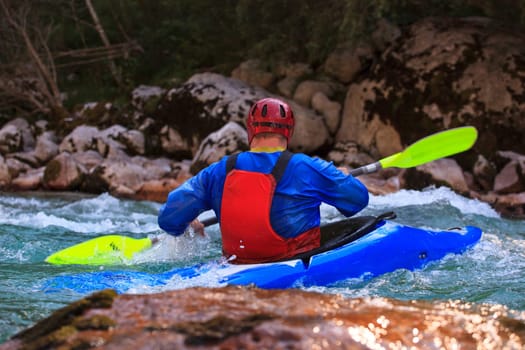 Kayaking in the summer on the Soca river, Slovenia