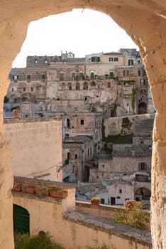Sassi of Matera through a stone arch