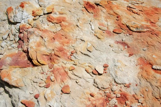 Yellow and red sandstone texture in the desert