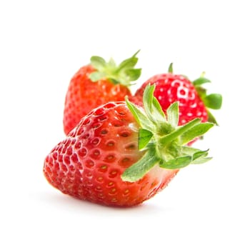 Three strawberries isolated on white