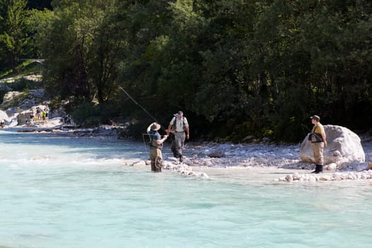 Photo of a Fisherman in the Soca river, Slovenia