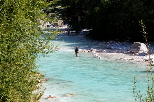 Photo of a Fisherman in the Soca river, Slovenia