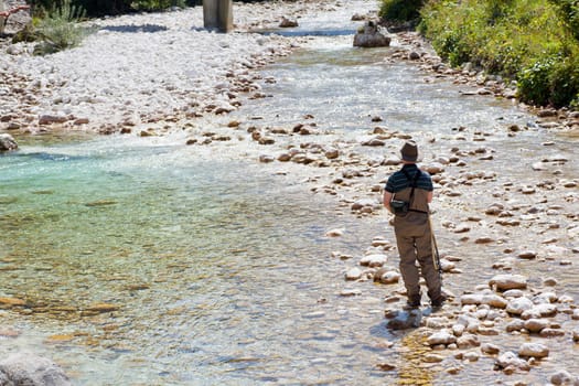 Photo of a Fisherman in the Soca river, Slovenia