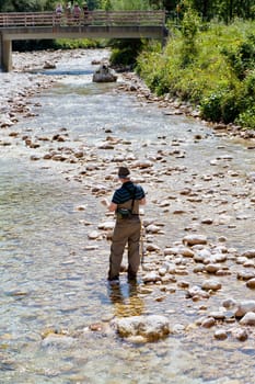 Photo of a Fisherman in the Soca river, Slovenia