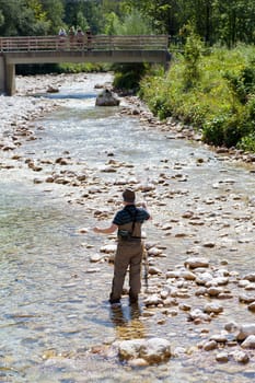 Photo of a Fisherman in the Soca river, Slovenia
