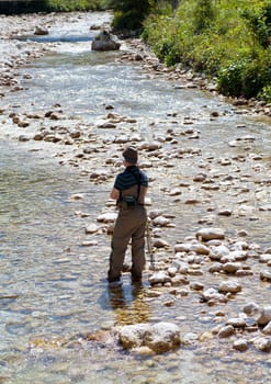 Photo of a Fisherman in the Soca river, Slovenia