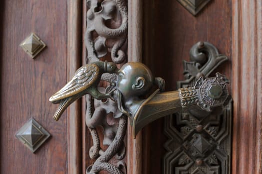 The latch on the gate of the castle Hluboka nad Vltavou near Ceske Budejovice, Czech Republic