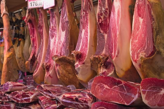 Prosciutto hams ready for sale at the market