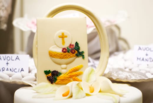 Cake and decorations for the celebration of First Communion