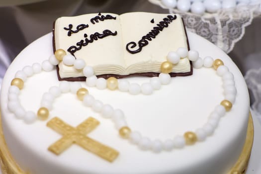 Cake and decorations for the celebration of First Communion