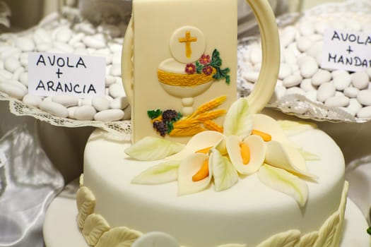 Cake and decorations for the celebration of First Communion