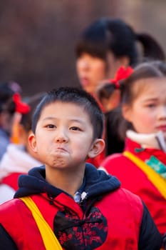 MILAN, ITALY - FEBRUARY 10, 2013: Child during Chinese New Year parade in Milan