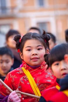 MILAN, ITALY - FEBRUARY 10, 2013: Child during Chinese New Year parade in Milan