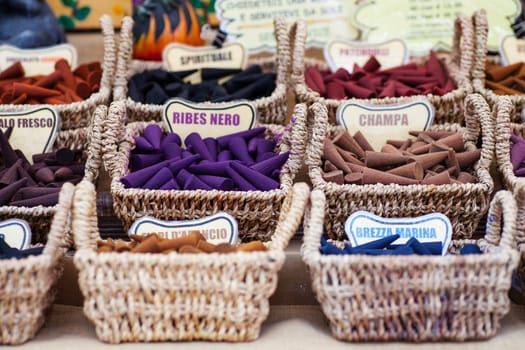 A lot of various scented Incense inside the wicker baskets