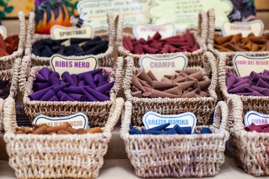 A lot of various scented Incense inside the wicker baskets