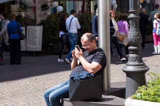 Man using the smartphone, Milan - Italy