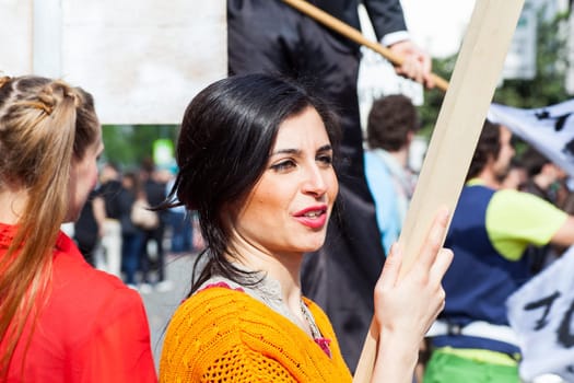 Girl with Wooden pole held by hand