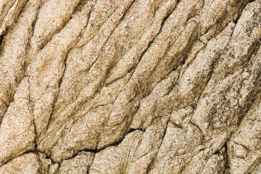 The surface of natural stone with cracks - background