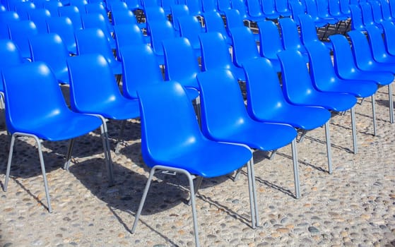 View of Empty blue chairs for outdoor cinema