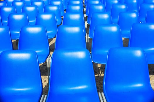 View of Empty blue chairs for outdoor cinema