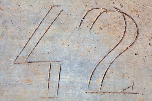 Photo of Numbers etched in stone