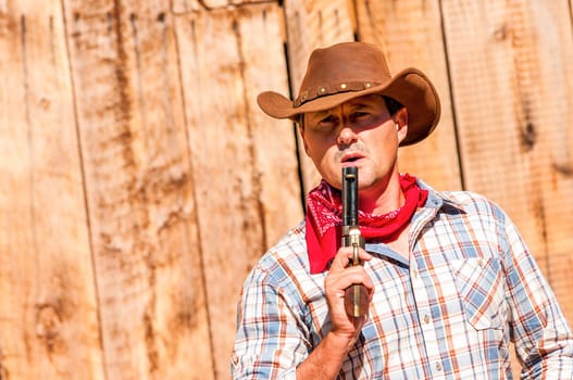 SOUTH WEST - A cowboy takes time to rest and reflect.