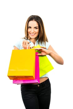 portrait young adult girl with colored bags