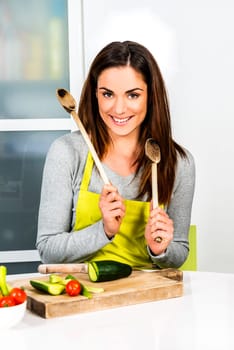 Young Woman Cooking. Healthy Food - Vegetable Salad. Diet. Dieting Concept. Healthy Lifestyle. Cooking At Home. Prepare Food