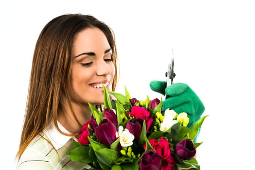 Gardening. Woman worker with flowers. Isolated over white background